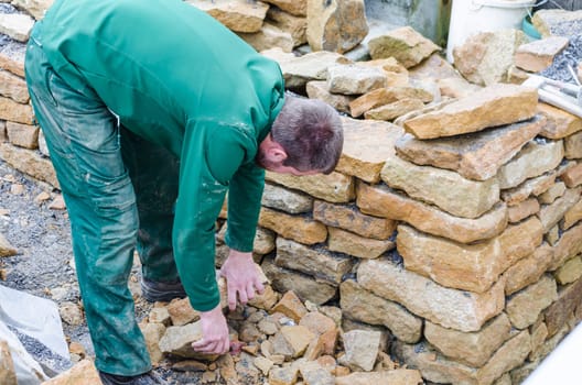 Sandstone wall for a high bed. Create a dry wall.