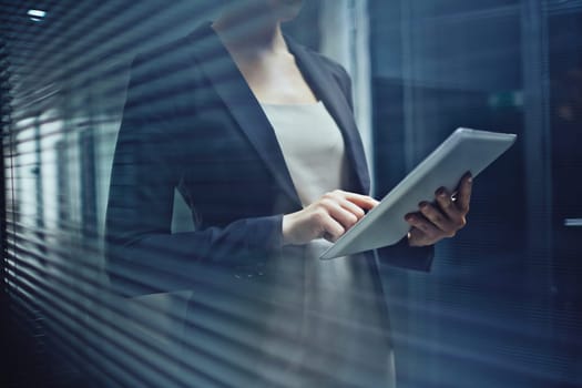 Close-up of businesswoman browsing with touchpad