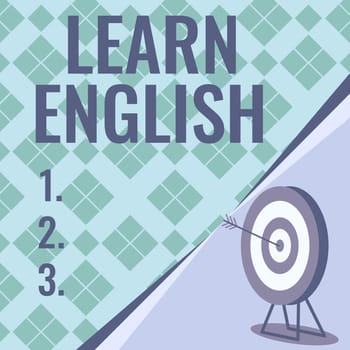 Hand writing sign Learn English, Word for Universal Language Easy Communication and Understand Target With Bullseye Representing Successfully Completed Project.