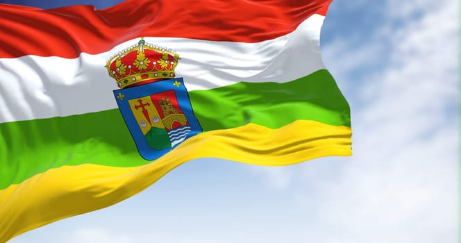 La Rioja flag waving in the wind on a clear day. La Rioja is an autonomous community and province in Spain, in the north of the Iberian Peninsula. Its capital is Logroño