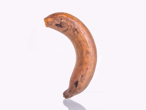 Rotten banana isolated on white background