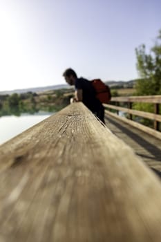 Detail of young man looking at nature, contemplation and relaxation