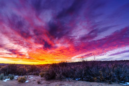 Spectacular sunsen in high desert in New Mexico in winter