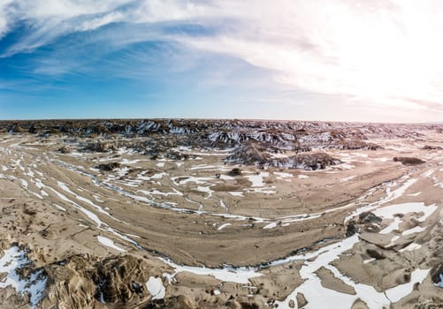Aerial panoramic view of Bisti De-Na-Zin Wilderness area in New Mexico in winter
