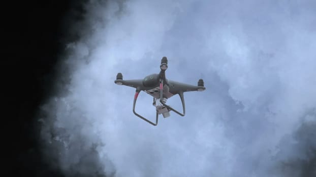 Drone flying aganst stormy clouds