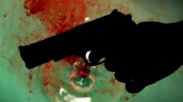 Pistol silhouette agains bloody background