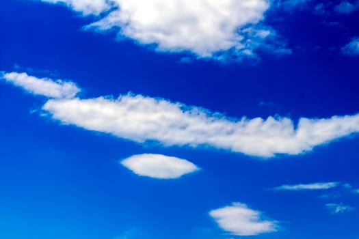 Blue sky and white puffy clouds