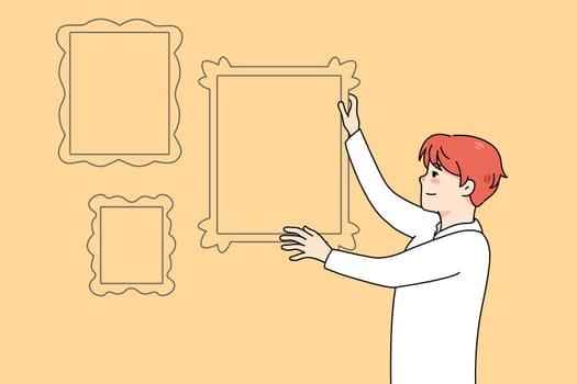 Man hanging frames with family pictures on wall. Happy male putting portrait for memory. Nostalgia concept. Home decoration. Vector illustration.