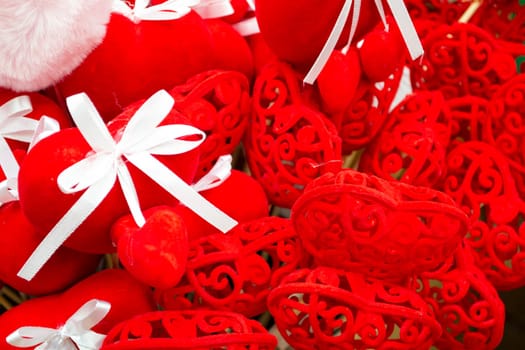 Valentine day concept. Many red hearts for flowers on red background. Postcard banner on valentines day. Love date lovesick wedding romance symbol. Valentines day gift close up