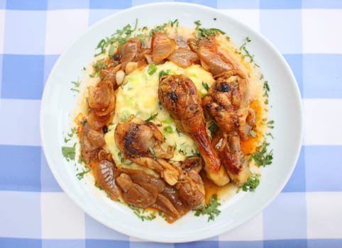 Chicken legs close up braised with butcher's onions served with mashed herb potatoes greek cuisine modern high quality print