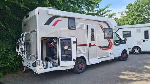 Family vacation trip camper van, holiday trip in motorhome, caravan vacation.