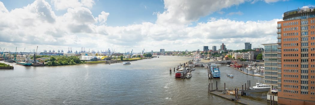 Post card view city hamburg harbor with ships closeup