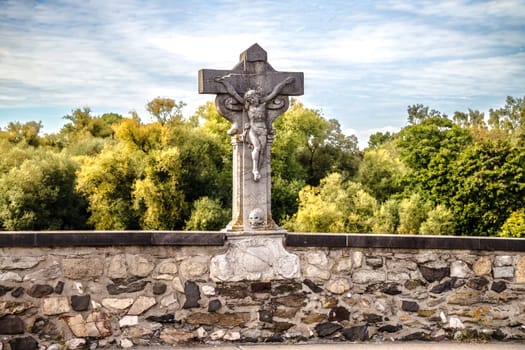 Stone Jesus on Bridge in Limburg Hesse on a sunny Day