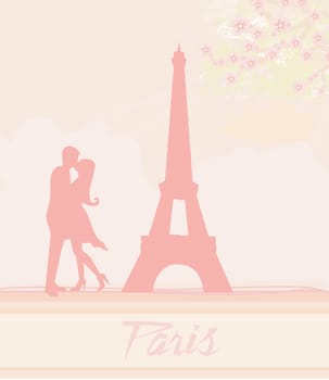 Romantic couple in Paris kissing near the Eiffel Tower