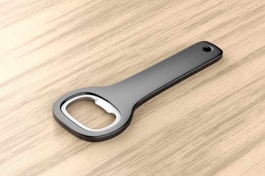 Black bottle opener on wooden table