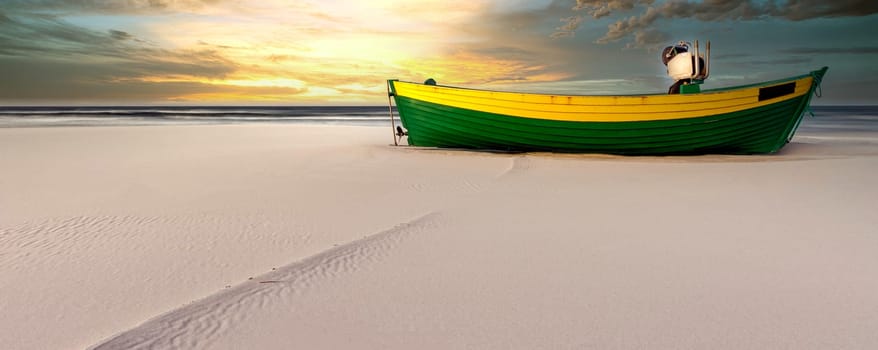 Sunrise over Baltic Sea with empty fishing boat - Debki, Pomerania, Poland