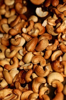 Backed cashews close up background modern high quality print Anacardium occidentale family anacardiaceae