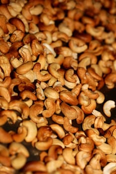 Backed cashews close up background modern high quality print Anacardium occidentale family anacardiaceae