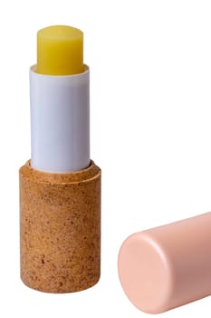 Lip balms. Close-up of a pink brown lip care stick or chapstick isolated on a white background. Macro. Cosmetics for face. Concept beauty. Space.