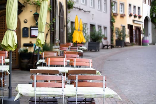 Cozy restaurant on the narrow street of the old town in Meersburg, Germany