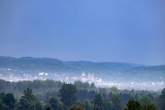 Weingarten, Germany: View at the Basilika over the city on a foggy day