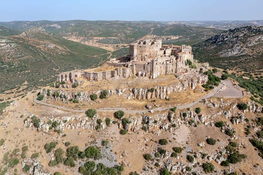 The hilltop castle fortress and former convent of Calatrava La Nueva, in Aldea Real, Ciudad Real province Castilla La Mancha Spain, Aerial view from above
