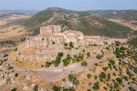 The hilltop castle fortress and former convent of Calatrava La Nueva, in Aldea Real, Ciudad Real province Castilla La Mancha Spain Ciudad Real, Castilla la Mancha, Spain, Rear overhead aerial view
