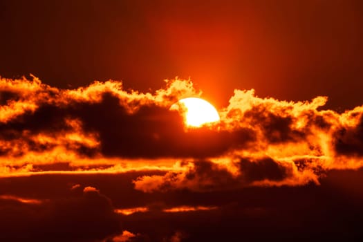 Beautiful colorful orange sky with clouds at sunset