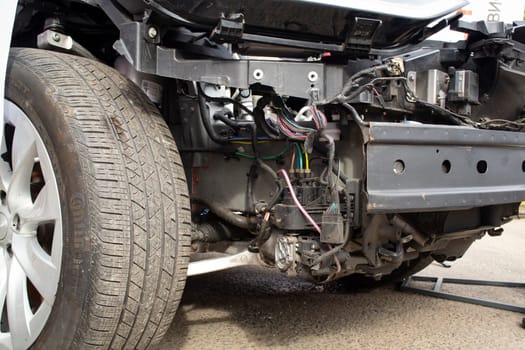 MINSK, BELARUS - Juin 18 2022: Above view of Tesla Model X plug-in electric car chassis and battery. Close up