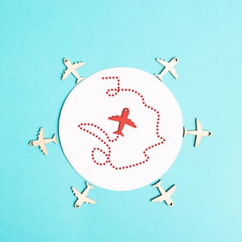 Red airplane in the middle tries to find an exit, searching for freedom, think outside the box, be different, finding a strategy, leadership concept