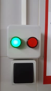 Switch attached on public toilet to inform if the it is occupied. Hygiene habits concept during Covid-19 pandemic