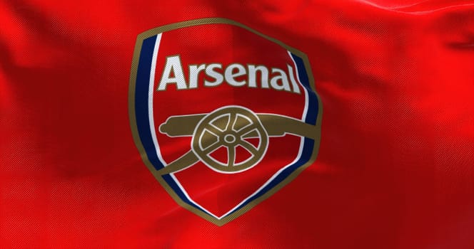 London, UK, May 2022: The flag of Arsenal Football Club waving. Arsenal is a professional football club based in Islington, London, England.