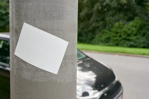 blank white sticker with space for text on roadside pillar