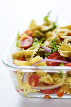 close up of a tray of pasta salad