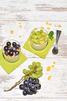 Lean yoghurt with cornflakes and grapes,fresh mint,studio