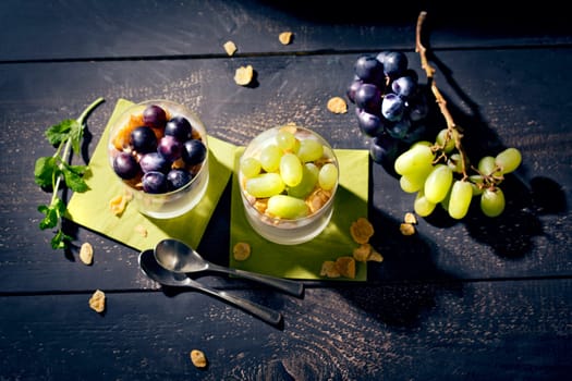 Lean yoghurt with cornflakes and grapes,fresh mint,studio