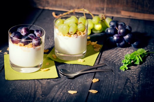 Lean yoghurt with cornflakes and grapes,fresh mint,studio