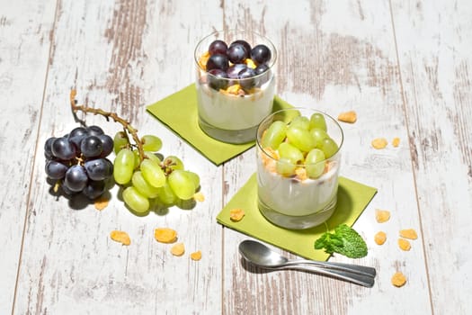 Lean yoghurt with cornflakes and grapes,fresh mint,studio