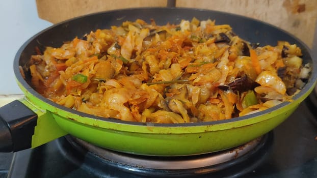 meat vegetables stewed onion frying pan healthy food meat vegetables stewed onion frying pan home cooking stove cooking recipe dish dinner lunch delicious, horizontal format photo. High quality photo