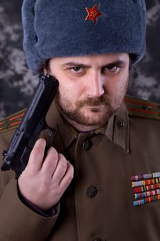 young man dressed as russian military, studio