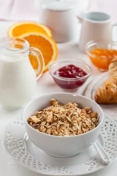 Breakfast with cereal, milk, orange juice