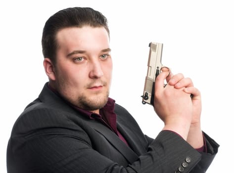 Young man holds a gun