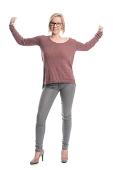 Young woman with glasses shows strength