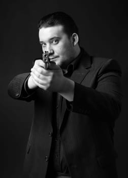 Young man targets with a gun