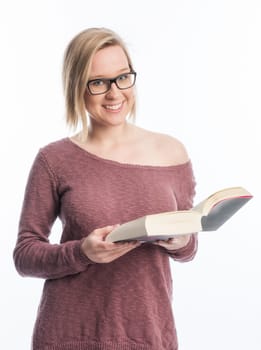 Young woman with glasses holds a book