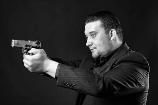 Young man targets with a gun