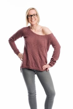 Young woman in jeans wears black glasses