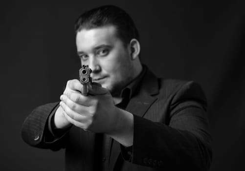 Young man targets with a gun