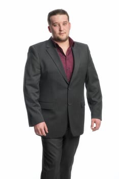 Young man with three-day beard in suit