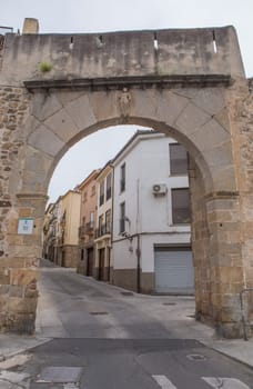 Coria Gate at Medieval street at Plasencia Old town, Caceres, Extremadura, Spain